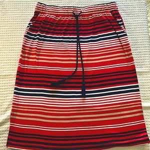 St. John’s Bay Red, Blue, tan & white stripes. Pockets, stretch cotton. Size M